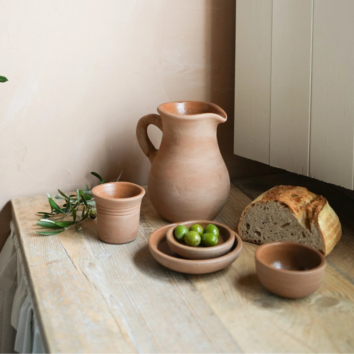 Hand-thrown Tuscan terracotta jug