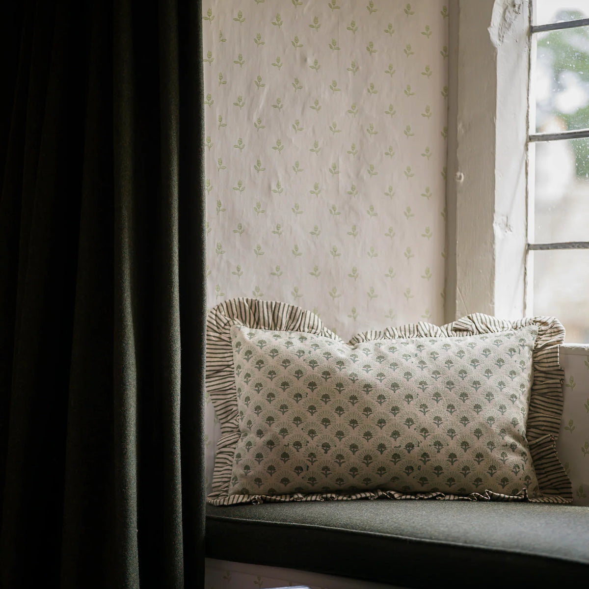 Fanflower floral block print cushion in Forest with striped trim