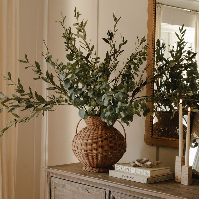 Styled console with vases and stems
