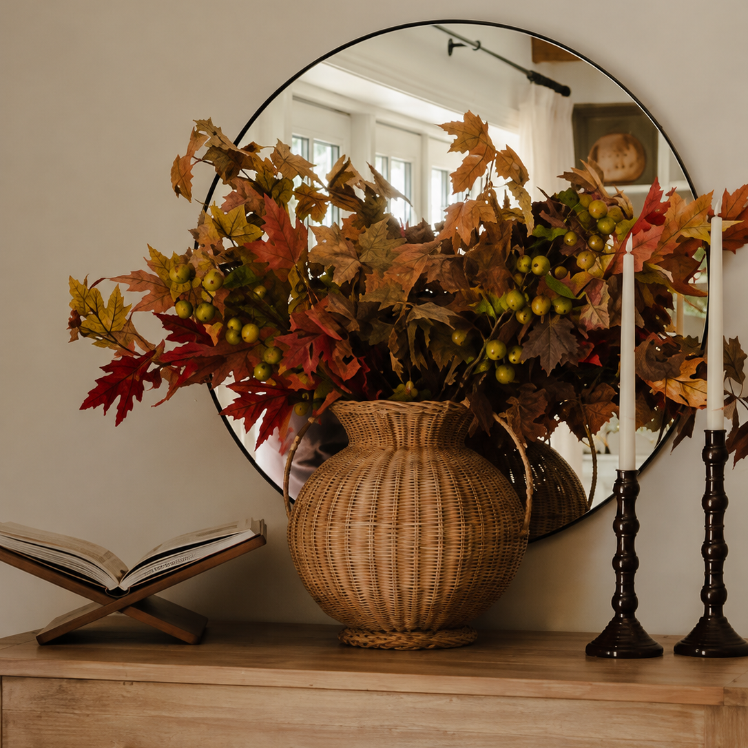 Foraged autumn arrangement styled in vase, mixed colours