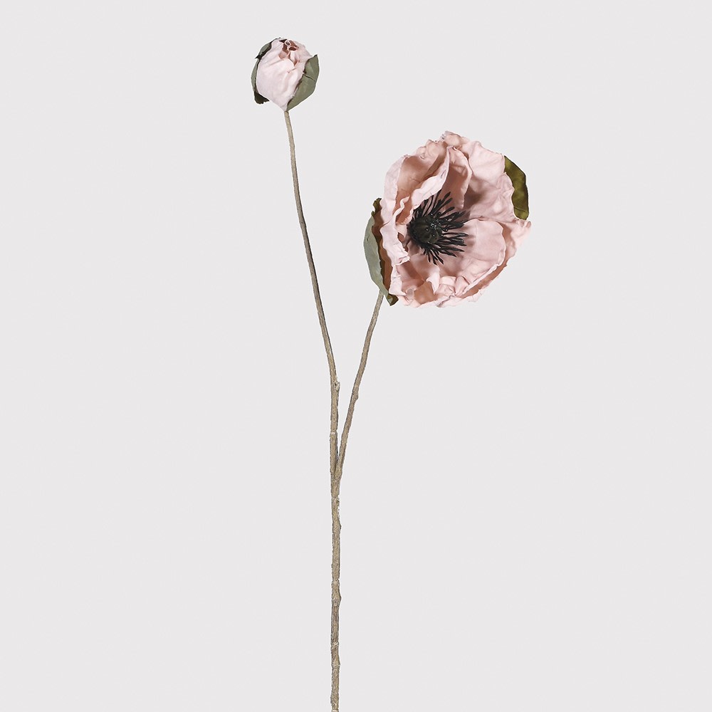 Single pink artificial flower on a white background