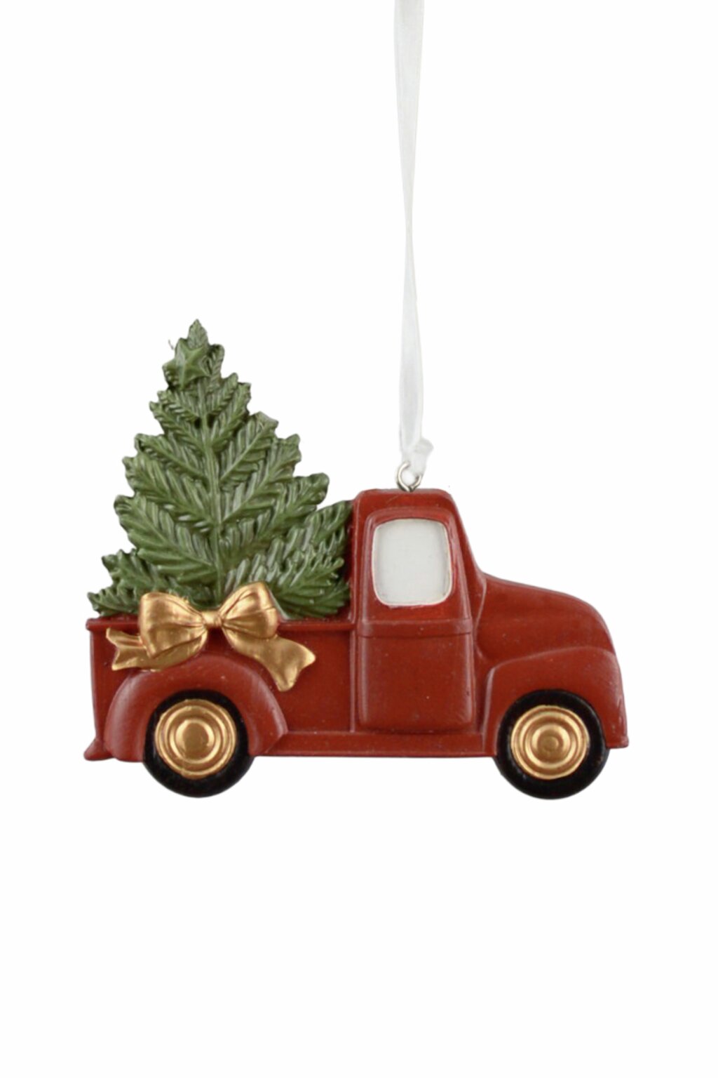 Green and red Christmas truck ornament carrying a Christmas tree