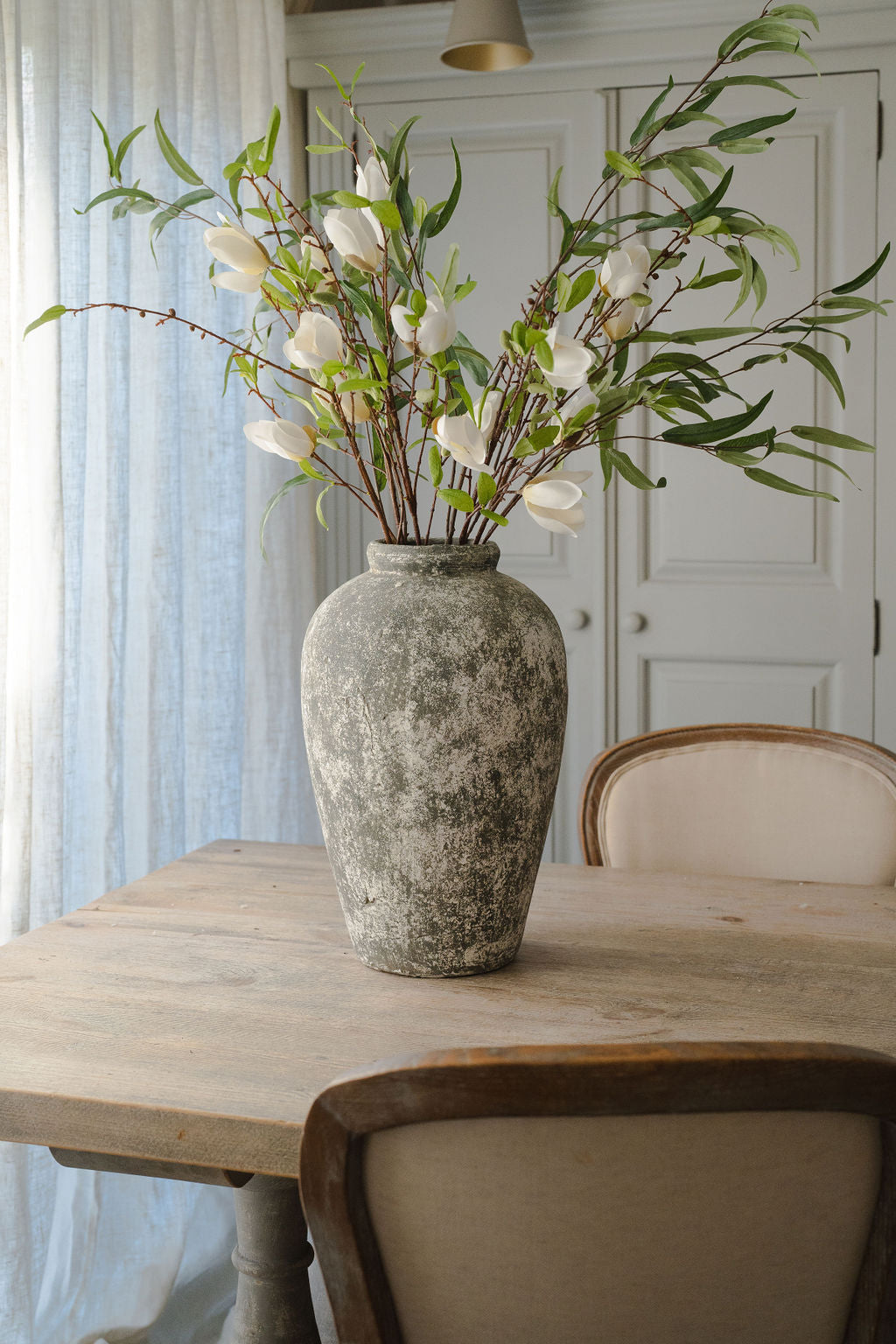 Tall Aged Stone Vase